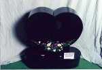 #54 - Black granite heart - Color etched flowers with rounded ends on the base.